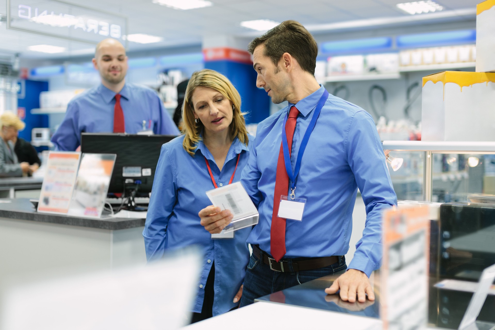 Retail store manager and his team